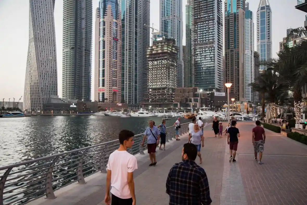 Walking in Marina Walk: Shopping and Leisure Experience by the Water